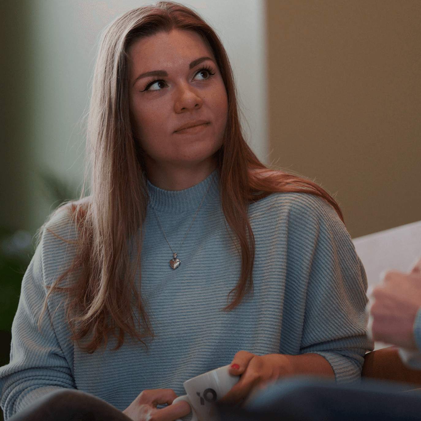 Female coworker listening