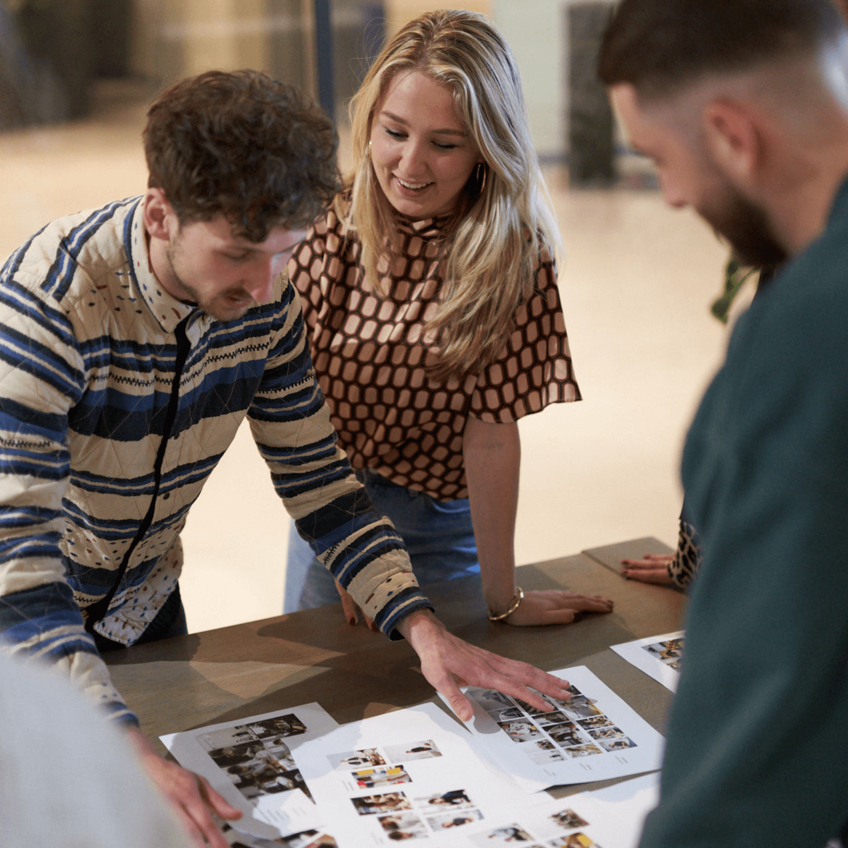 Coworkers discussing designs
