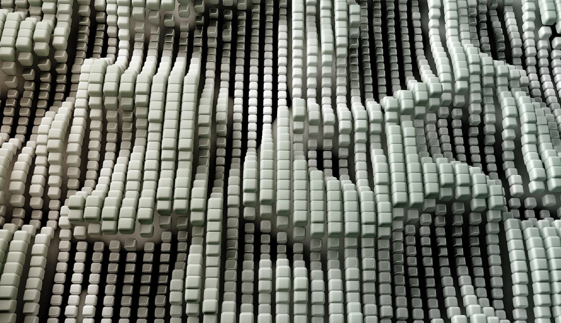 Abstract 3D art with numerous small, raised cubes forming a wavy, textured surface in grayscale tones.