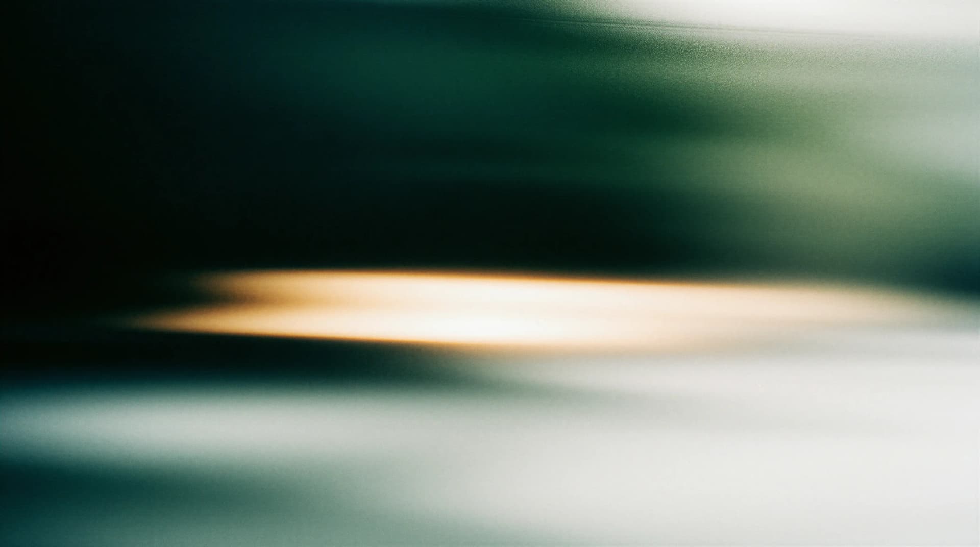 Abstract image with blurred green and white horizontal streaks, and a central warm glow creating a soothing, ethereal effect.