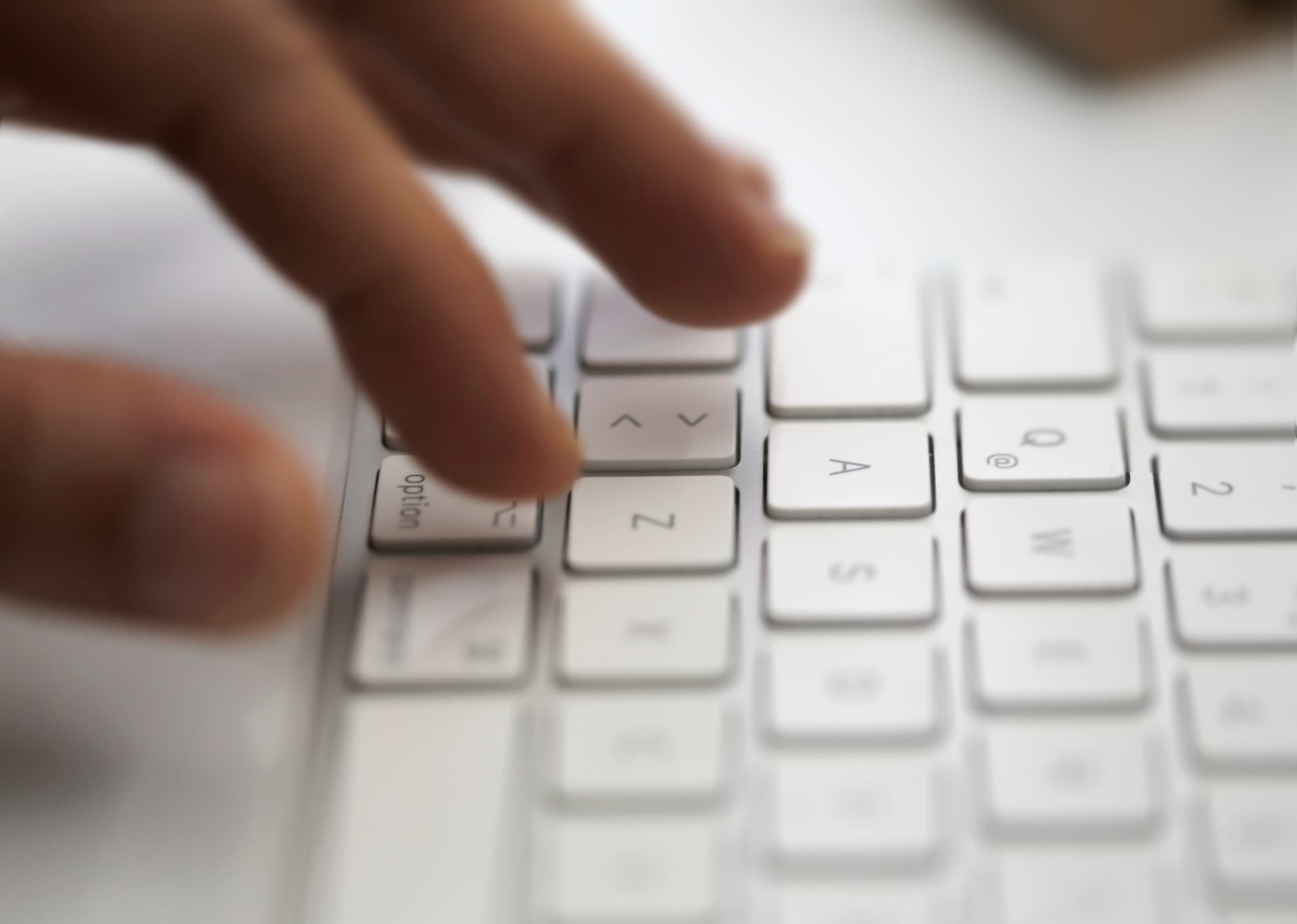 QWERTY keyboards and a hand