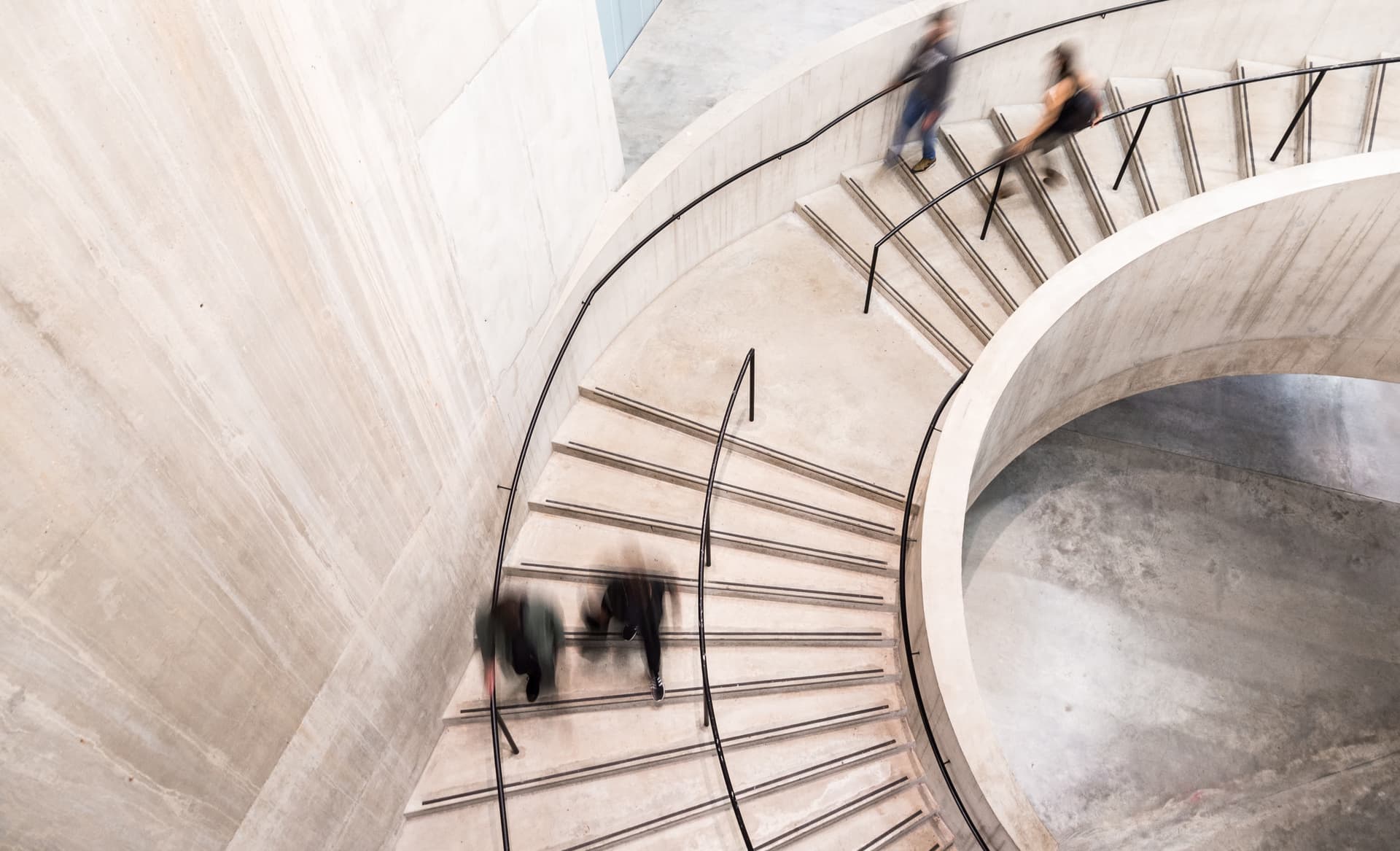 Light staircase with some moving people