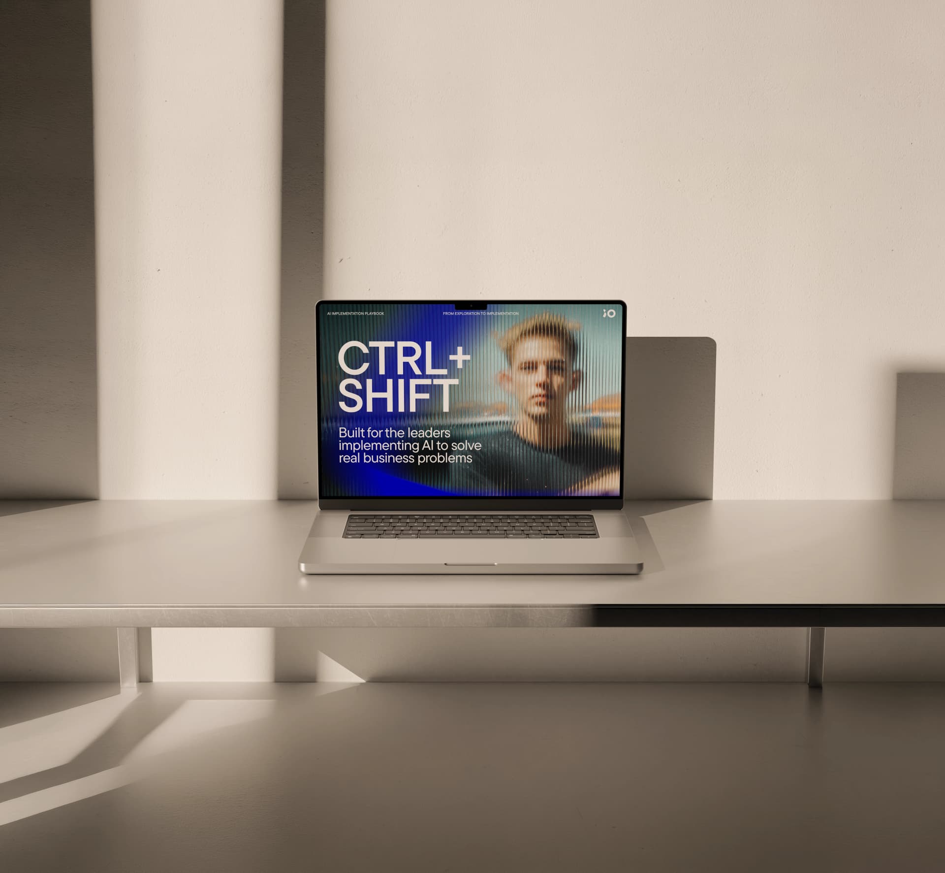 A laptop on a minimalist desk displays a screen with the words "CTRL+SHIFT," promoting AI solutions for business leaders.