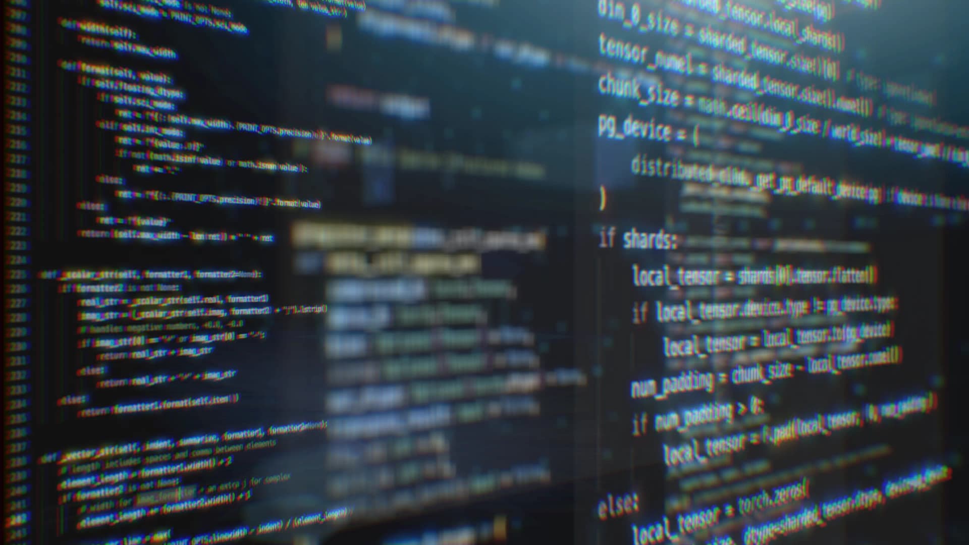 Blurry, multicolored lines of computer code on a dark screen showing various programming elements.